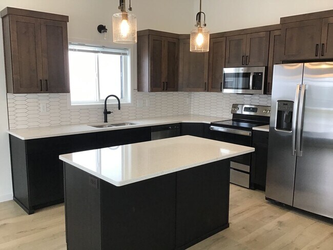 Building Photo - New 3 Bedroom/3 Bathroom House