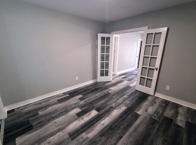 Building Photo - Fully Renovated 3-Bedroom Rental – New Appliances, Huge Yard, Garage, & Individual Room A/C!