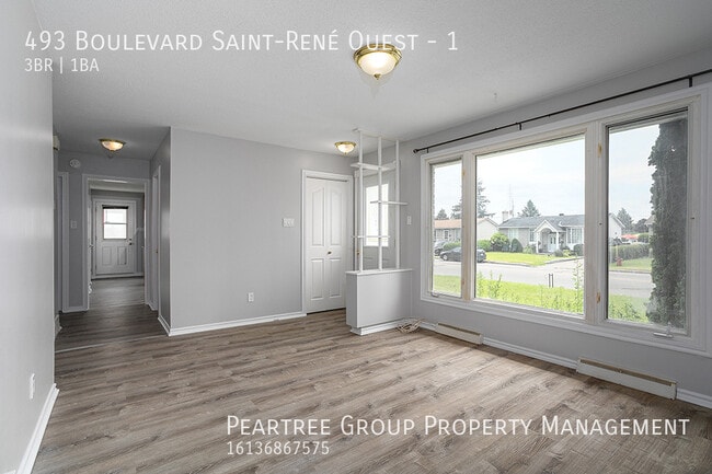 Building Photo - Spacious 3BR Bungalow with Private Yard & Parking –  493 St-René Blvd West, Gatineau