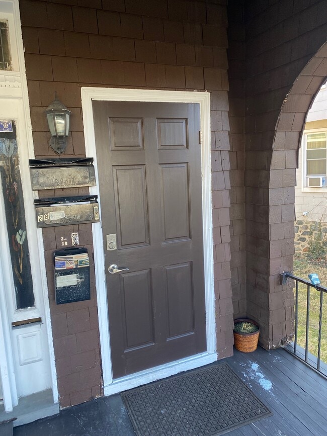 Main front door with electronic keylock - 4103 Liberty Heights Ave