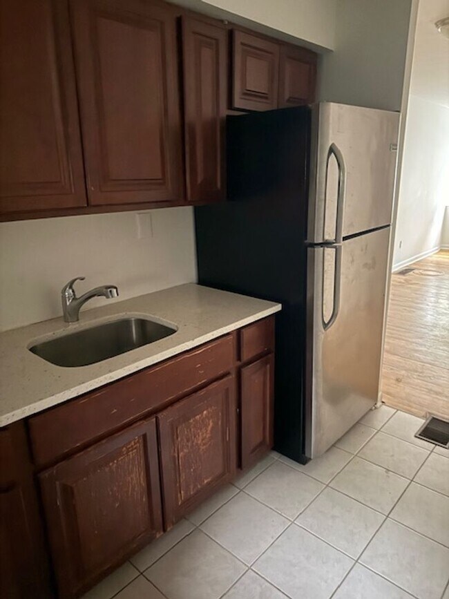 Photo - Renovated 2-Bedroom Apartment with Backyar...