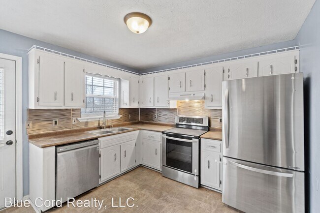 Building Photo - 3 br, 1.5 bath House - 1011 Cooper Drive