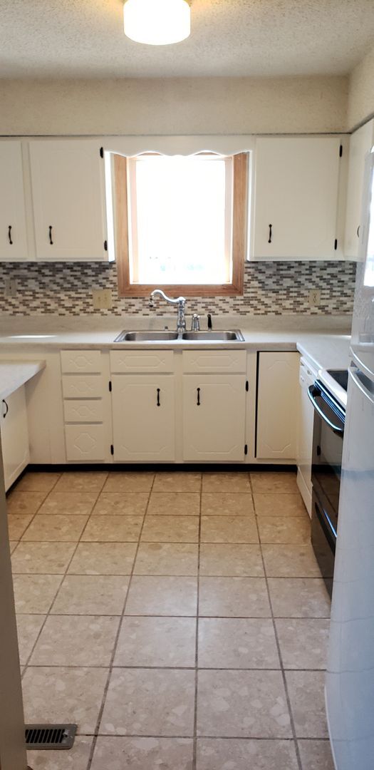 Building Photo - Quality Home Management