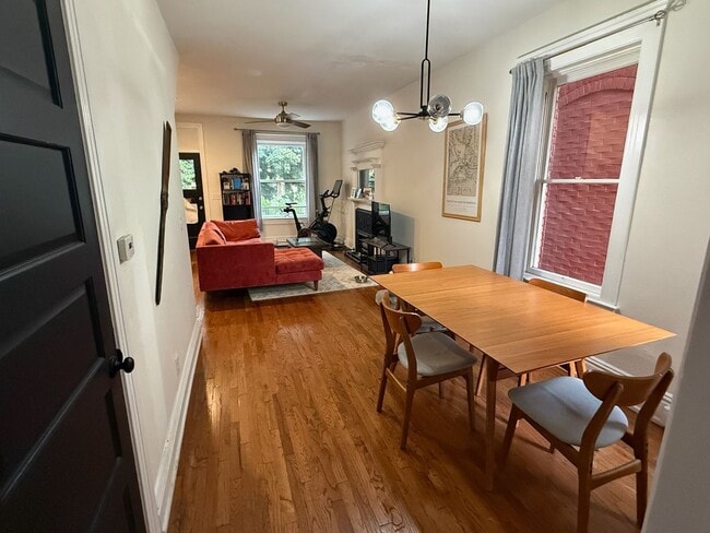 Building Photo - Remodeled 2 Bed / 2 Bath ½ Townhome | Private Rooftop Patio + Detached Garage |  Available Early ...