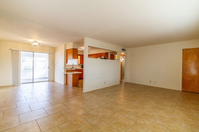 Building Photo - Introducing a captivating Living Space tha...