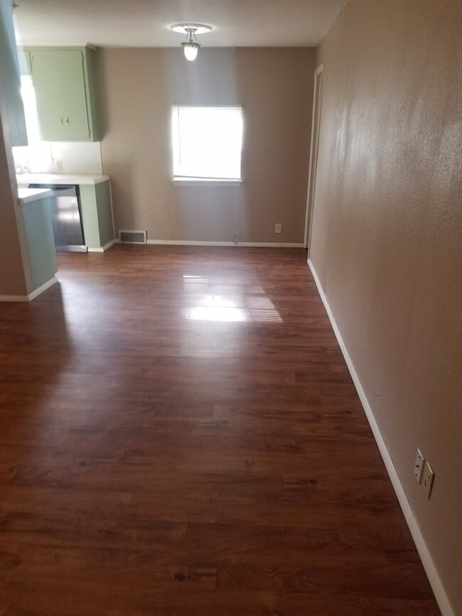 Building Photo - Backs to Open Space