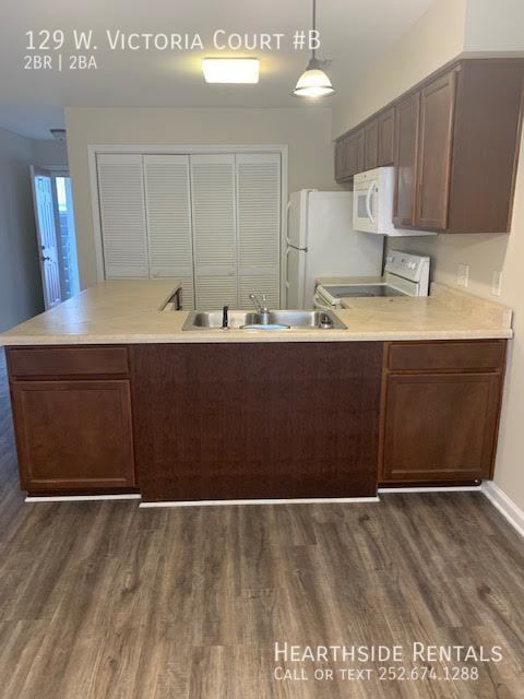 Foto del edificio - "Charming 2-Bed, 2-Bath Condo with Cozy Fi...