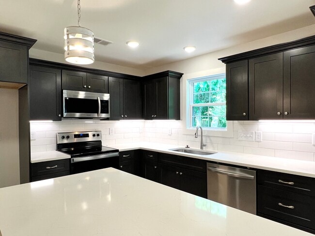 Building Photo - Stone Haven Villas