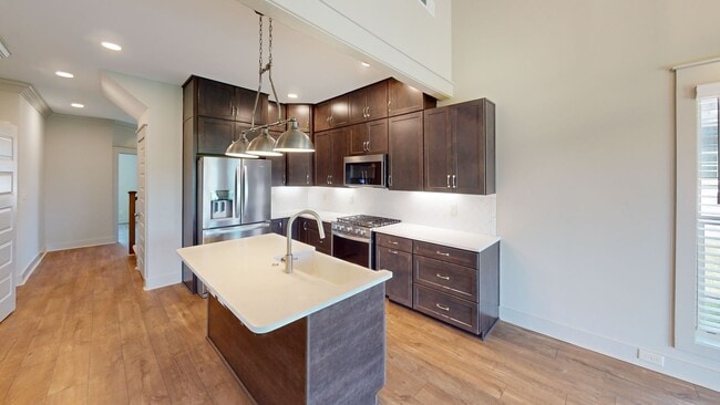 Building Photo - Stylish Veridian Townhome with Main-Level Primary Suite, Large Kitchen Island and Covered Back Patio