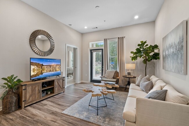 Living room with hard surface flooring - Avalon at Palisades