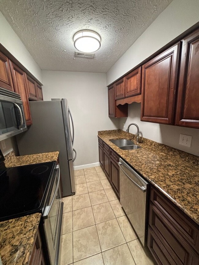 Building Photo - 6902 Kings Crossing Way