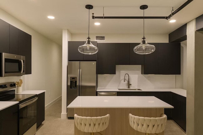 Foto del edificio - 115 W 5th St