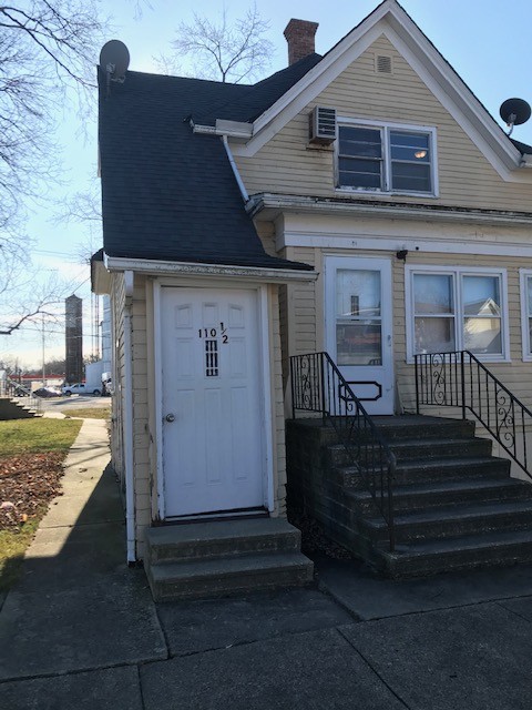 private entry door, stairway - 110 W John St