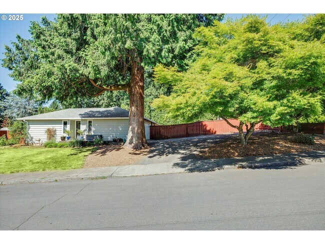 Building Photo - Single-Level Beaverton Home with Stone Fireplace, Open Kitchen & Large Fenced Outdoor Space