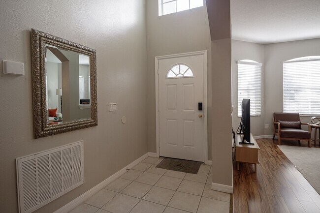 Building Photo - Golf Course Front 5BR Pool Home Near Disney | Resort-Style Living in Highlands Reserve