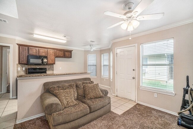 Building Photo - Beautiful two story townhome, crown molding, granite countertops, stained cabinets and carpeting ...