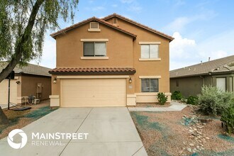 Building Photo - 42478 W Hillman Dr