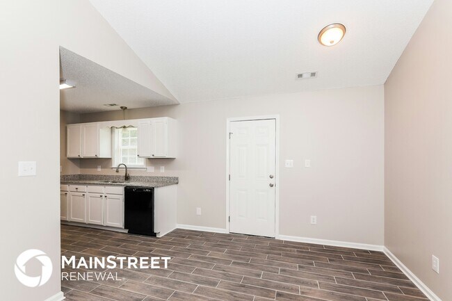 Building Photo - 6020 Windsong Way