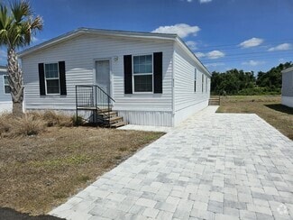 Building Photo - 6711 Hidden Oaks Dr