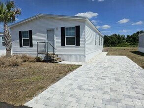 Building Photo - 6711 Hidden Oaks Dr