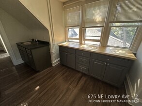 Building Photo - 675 NE Lowry Ave