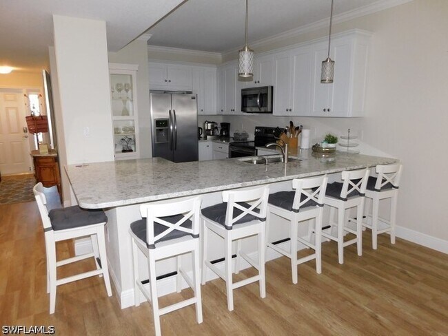 Foto del edificio - 7655 Pebble Creek Cir