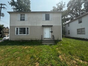 Building Photo - 1335 E 25th Ave