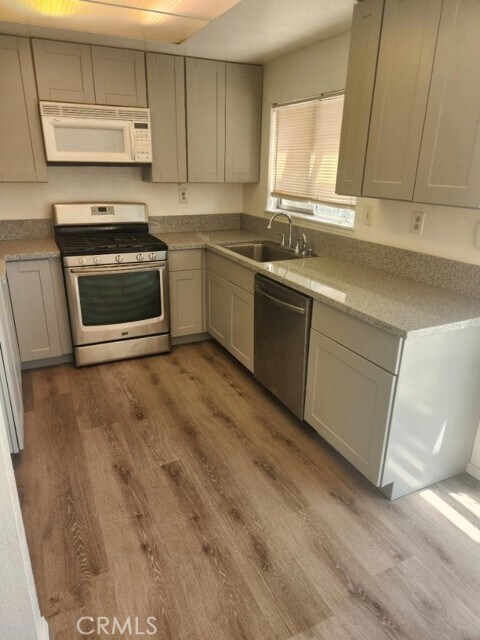 Building Photo - 6275 Woodpine Ave