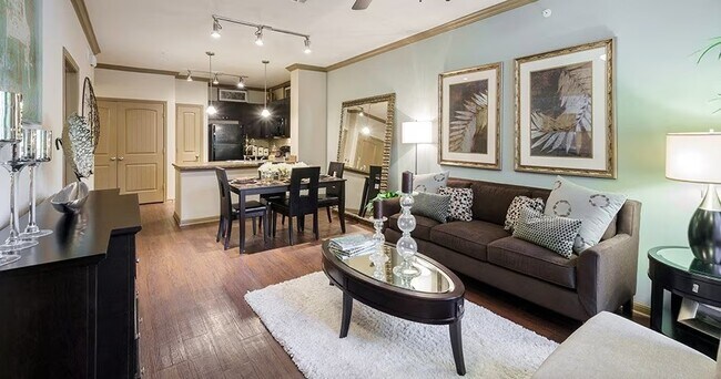 Building Photo - Spacious Living with Urban Convenience!