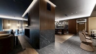 Located at 70 Nicholas St in Ottawa's dynamic urban core, this expansive single-floor amenity lounge is a masterclass in contemporary interior design. The space is thoughtfully organized into distinct yet interconnected zones, each serving a unique social or relaxation function while maintaining a cohesive, upscale aesthetic throughout.

Flooring transitions between rich warm-toned hardwood and large-format dark marble tile elegantly define the different areas, creating visual interest and a sense of intentional zoning. The lounge zone anchors the space with a dramatic slatted wood feature wall housing a large wall-mounted television and a sleek fireplace, surrounded by curved, plush seating and a low-profile coffee table set on a deep green area rug.

A bar and dining area features dark marble countertops, high stools with leather seats, and warm wood accents. Adjacent to this, a banquette seating corridor offers cream-upholstered curved booths and sculptural lounge chairs arranged around round tables, illuminated by warm wall sconces and recessed cove lighting.

Throughout, the dark coffered ceilings contrast beautifully with cream and warm neutral wall panels framed in rich walnut millwork. The space concludes with access to an outdoor terrace, visible through full-height glass doors, extending the lounge experience beyond the interior.