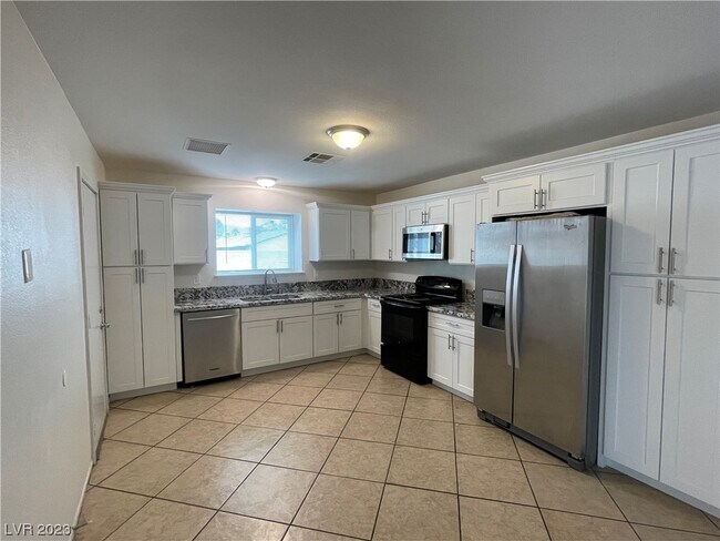 Foto del edificio - 6405 W Roy Rogers Dr