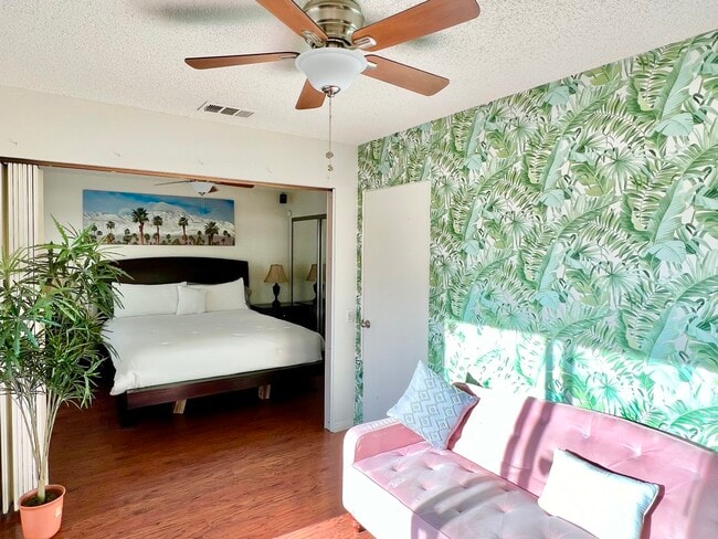 Pink couch is sofa bed - 82075 Country Club Dr