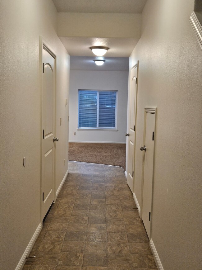 Entry hall, view into living room - 528 Fenton Ave