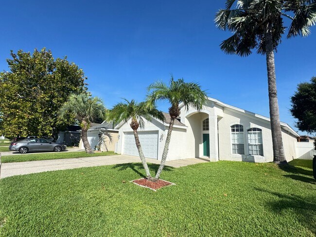 Building Photo - 3 Bedroom/2 Bathroom Beautiful Home in Kissimmee Hardwood floors