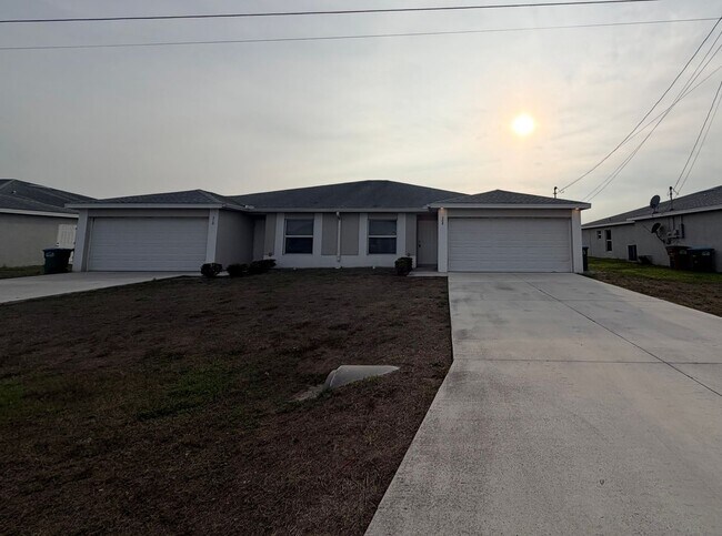 Building Photo - Duplex for rent on freshwater canal