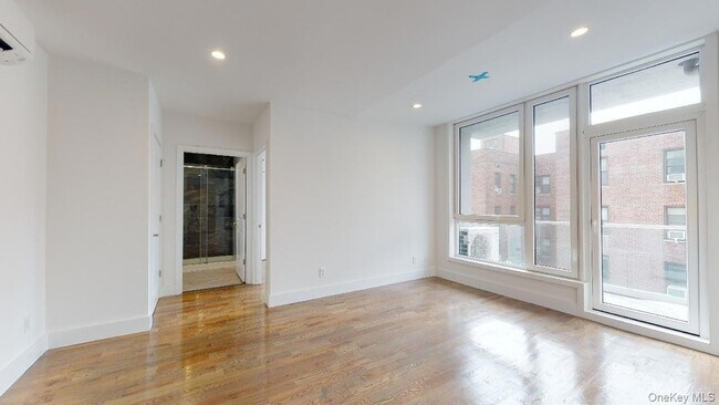 Building Photo - 138-28 Queens Blvd