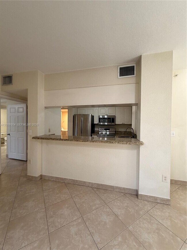Foto del edificio - 6640 W Sample Rd