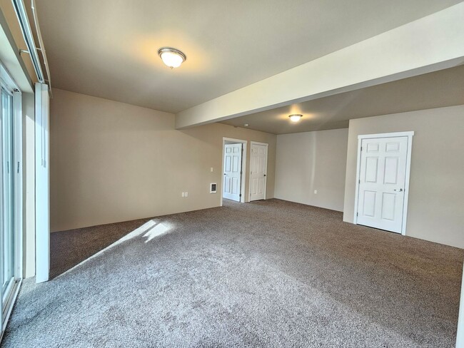 Building Photo - 5207-5207 E Upriver Dr