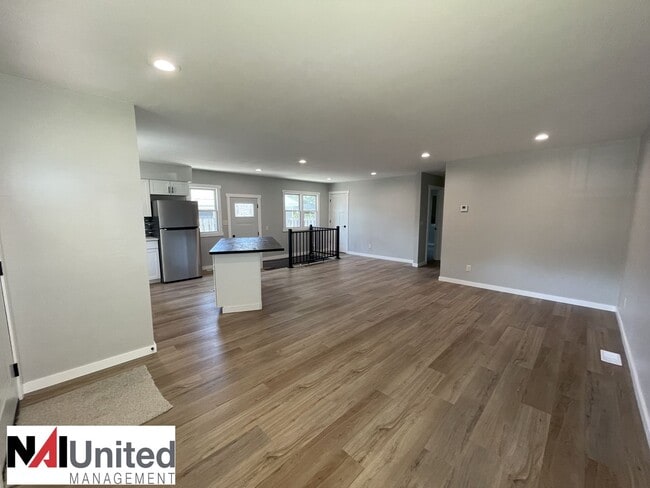 Building Photo - Three bed, one and a half bath home for rent