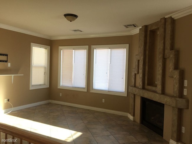 Building Photo - 9395 Roping Cowboy Ave
