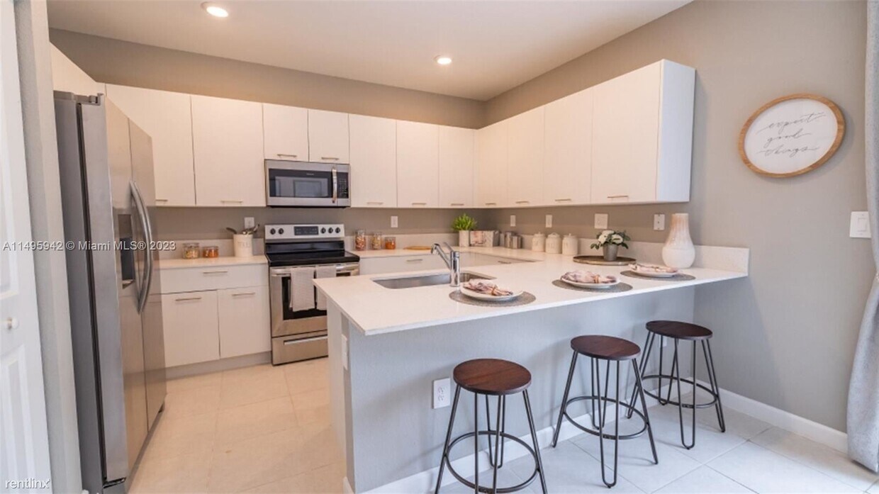 Foto principal - 3 br, 2.5 bath House - 12207 NW 23rd Ct