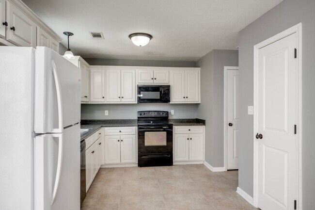 Foto del edificio - 716 Whispering Willow Way