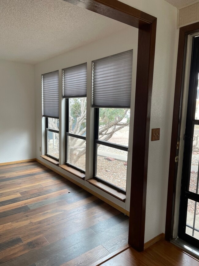 Front living space with floor to ceiling windows - 240 W Kyle Dr