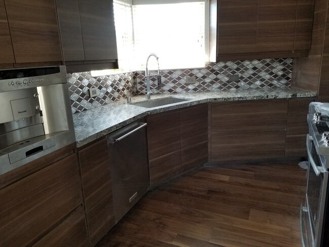 kitchen/ custom tile and granite - 10880 National Blvd