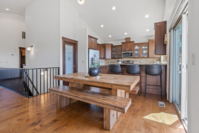 kitchen, walk in pantry, and dining - 3309 Stonecrop Way