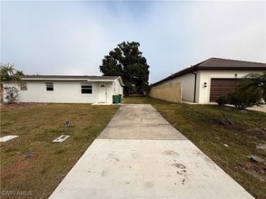 Building Photo - 531 99th Ave N