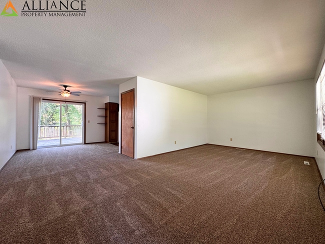 Building Photo - Home with Fenced Yard~Great West Side Loca...