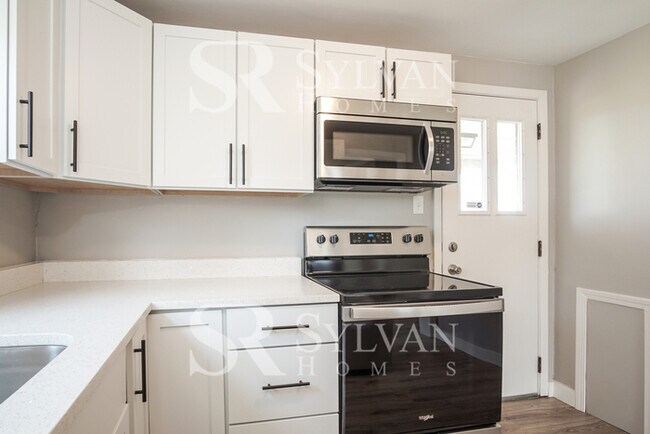 Foto del edificio - This home exudes a cheerful and welcoming charm!