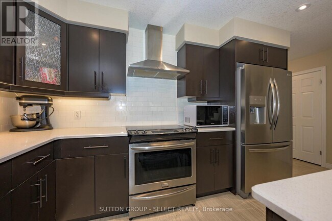 Photo du bâtiment - 1220 Riverbend Rd