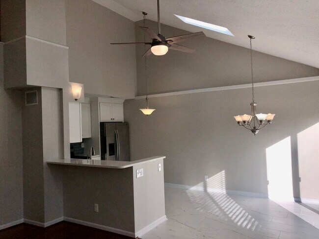 Kitchen and dining area - 4125 East Village Dr
